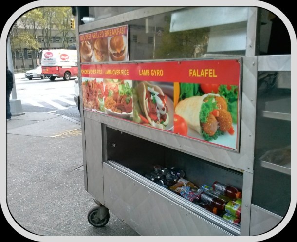 falafel cart on  corner in the city of Brooklyn, NYC